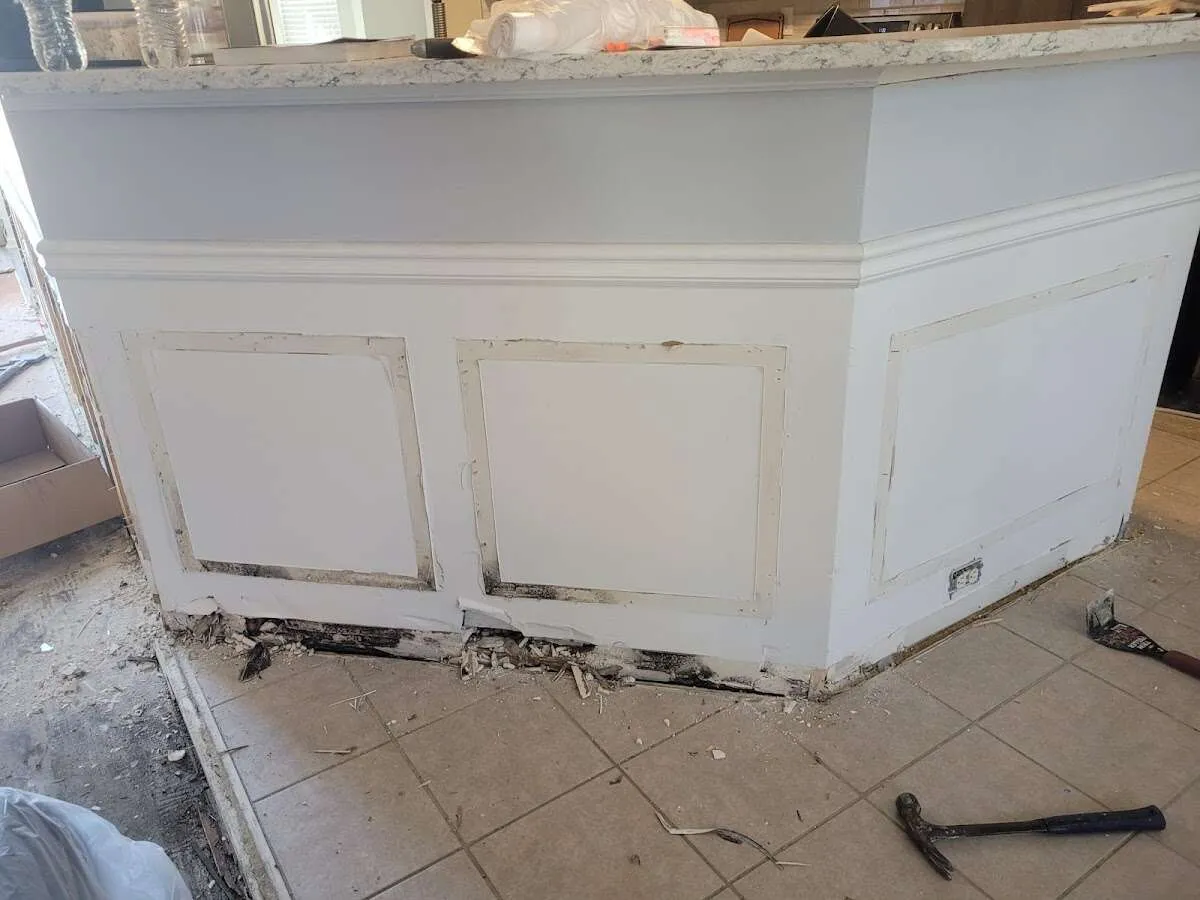 Water damage and mold on kitchen during Storm Damage Restoration in Tewksbury